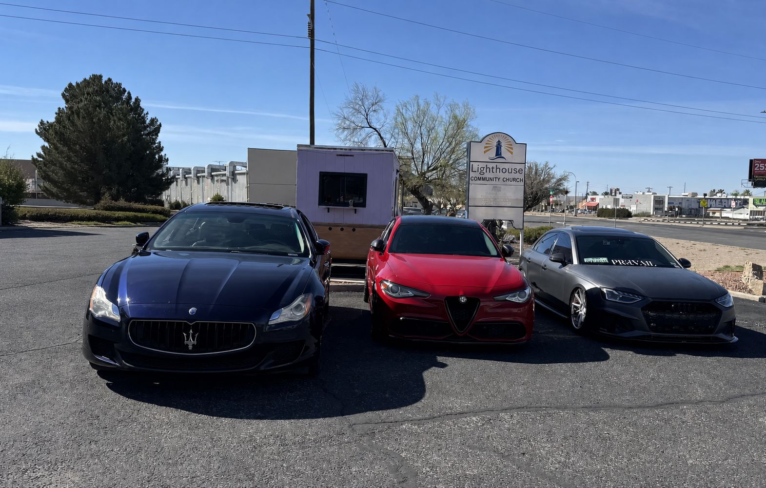 Cars displayed outside Jamila Coffee during Cars and Coffee